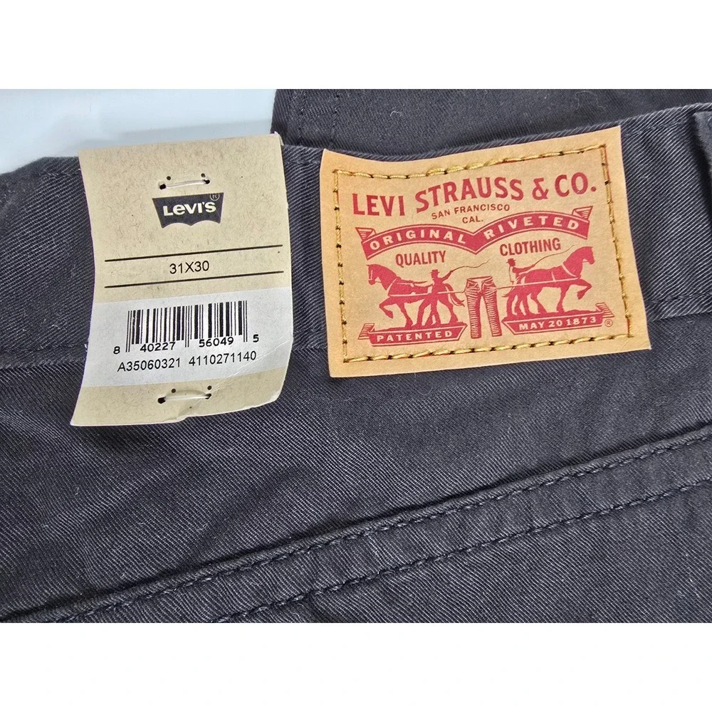 Levi's Black High Rise Tapered Leg 80s Mom Jeans Womens 31x30 IRREGULAR NWT